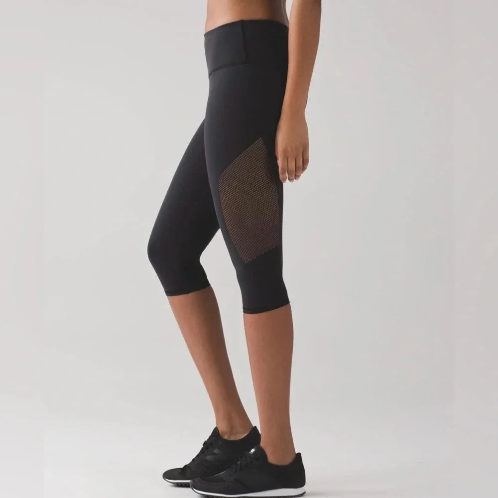 Lululemon Reveal Crop in Black. Mesh Sides. Size 12 or XL